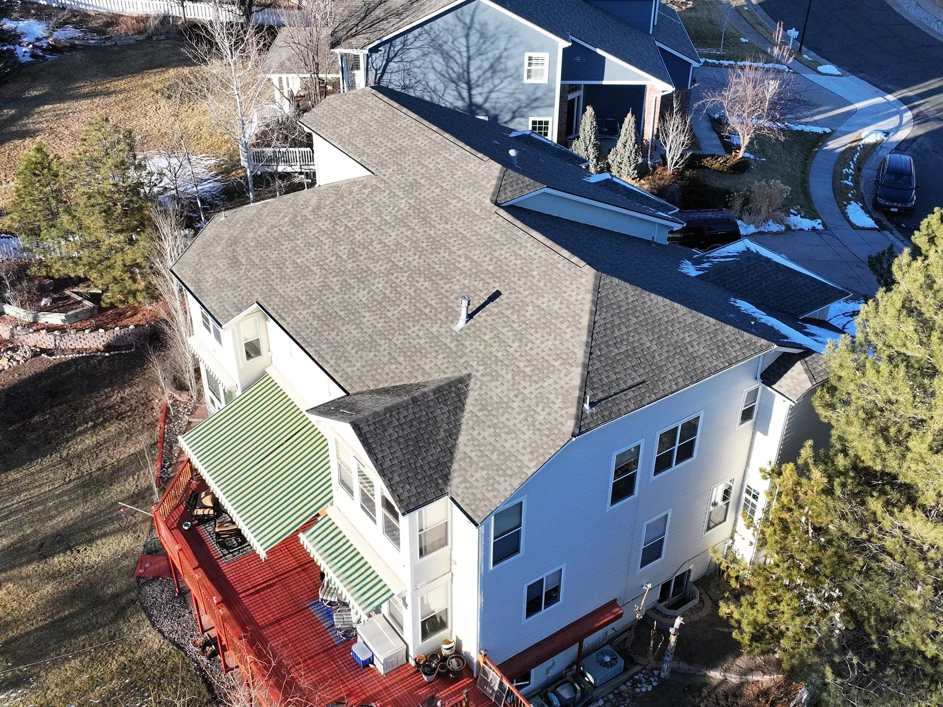 Completed asphalt shingle roof installed by Western Edge Exteriors