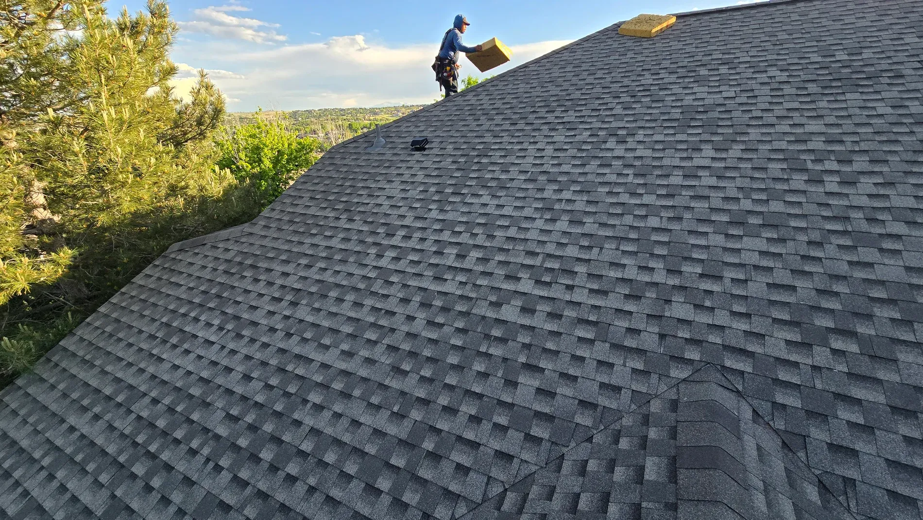 Western Edge roofing crew working on a Colorado home