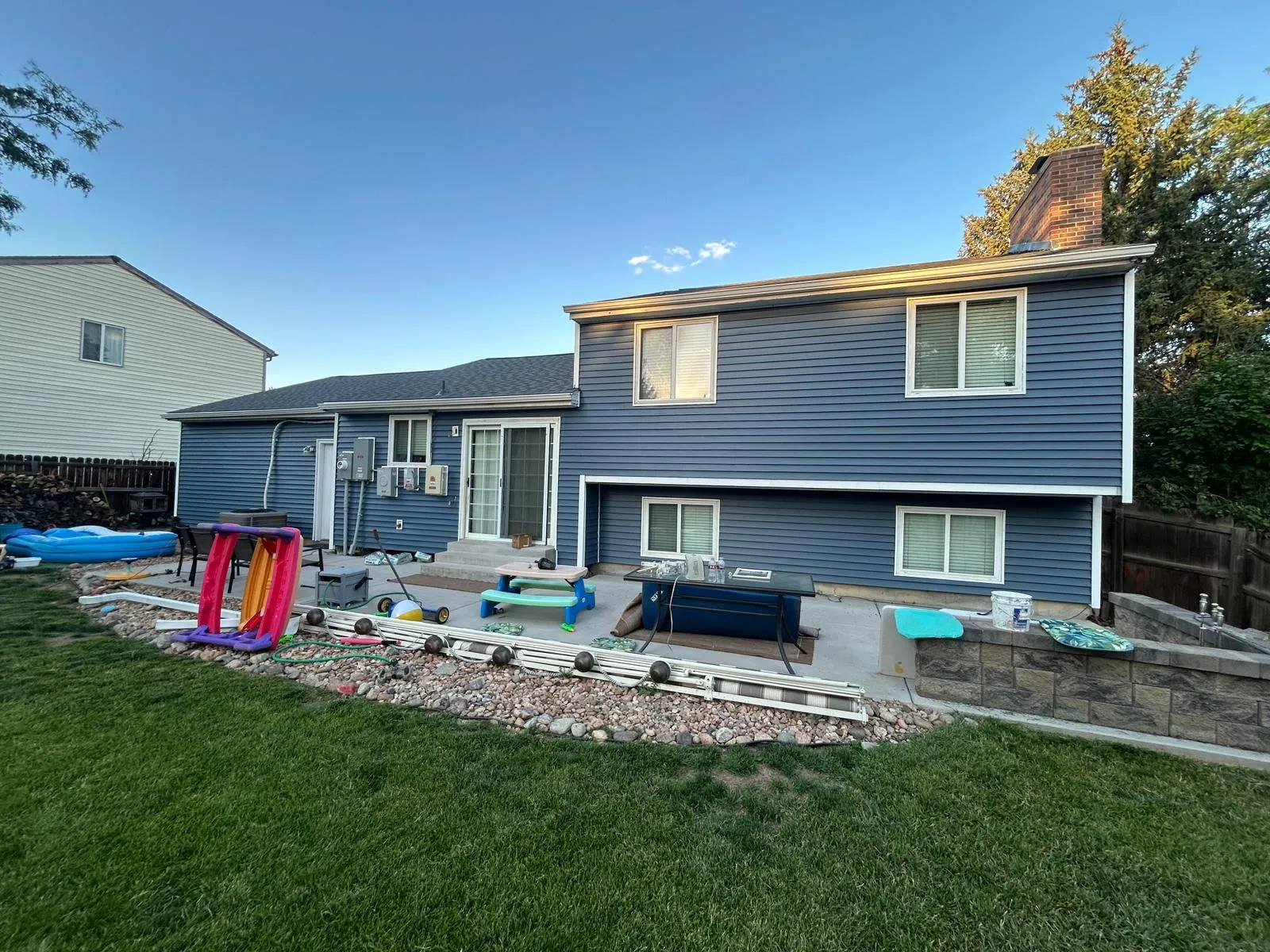 Completed siding project — backyard view